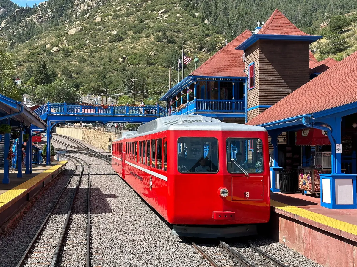 Red cog railway train at the Manitou Springs station
