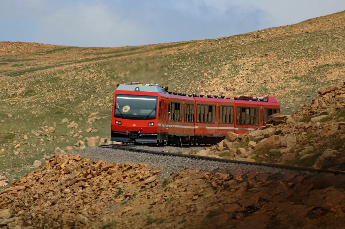 A Pikes Peak cog railway train approaching the summit